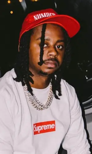 Babyface Ray wearing Supreme top