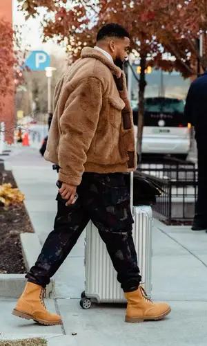 Jamal Adams’ Outfit in Acne Studios Jacket, Dior Pants & Celine Boots (2021)