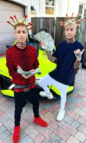 Flyysoulja wearing Dolce & Gabbana jeans