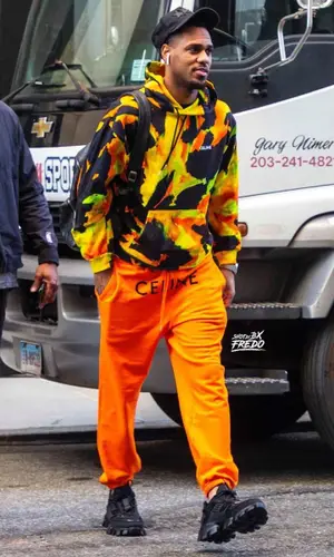 Monte Morris wearing Celine pants