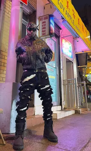 Bloody Dior’s Outfit in Louis Vuitton Jacket, Rick Owens Jeans & Balenciaga Eyewear (2021)