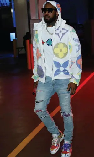 John Wall wearing Louis Vuitton t-shirt