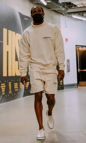 Mike Conley wearing Fear of God sweatshirt
