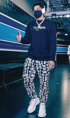 Bobby Shmurda wearing Palm Angels sweatshirt