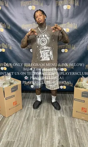 Moneybagg Yo wearing Prada sandal