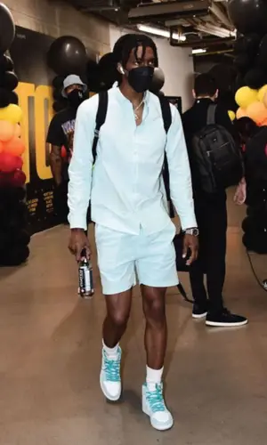 Terance Mann wearing Colorful Standard shirt