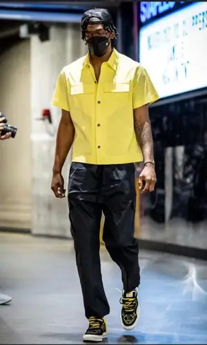 Terance Mann wearing Dolce & Gabbana pants
