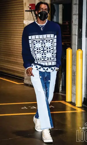 Terance Mann wearing Dolce & Gabbana sweatshirt