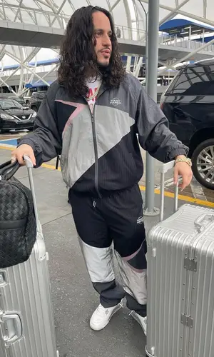 Russ wearing Daily Paper jacket