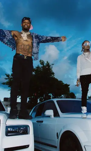 Tory Lanez wearing Amiri jeans