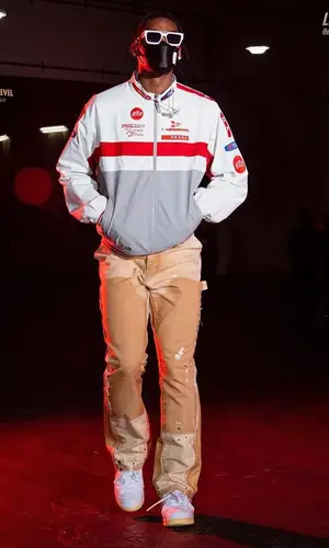 Joshua Christopher’s Outfit in Prada Jacket, Gallery Dept. Pants & Louis Vuitton Eyewear (2021)