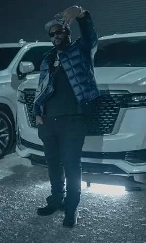 Peezy wearing Timberland boots