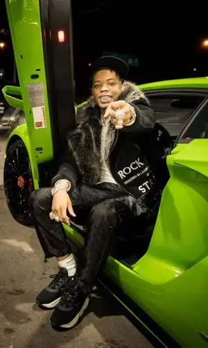 Lil Migo wearing Nike sock