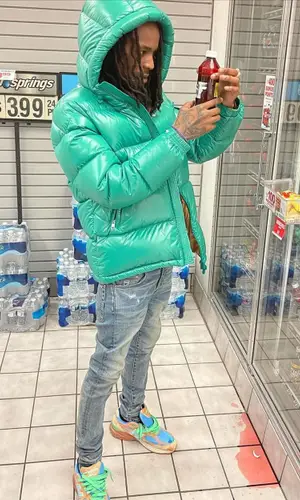 Baby Smoove’s Outfit in Moncler Jacket, Amiri Jeans & Dior Belt (2021)