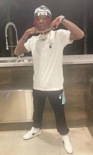 YNW BSlime wearing Off-White pants