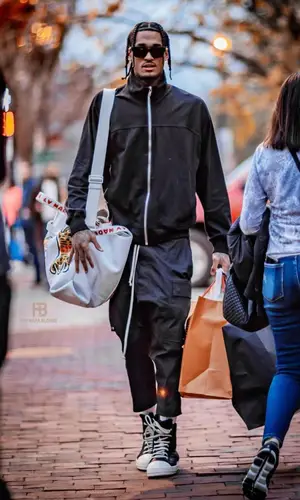 Jordan Clarkson wearing Louis Vuitton bag