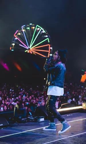 Wiz Khalifa wearing Wiz Khalifa Merch hat