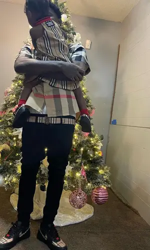 Quando Rondo wearing Burberry shirt