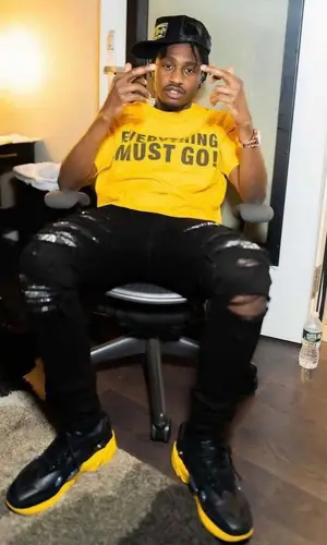 Lil Tjay wearing Chrome Hearts cap
