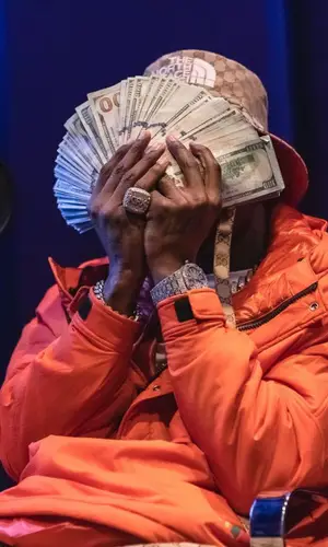 DaBaby wearing Gucci boots