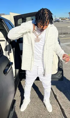 Moneybagg Yo wearing Faith Connexion shirt