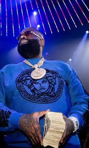 Rick Ross wearing Cartier eyewear