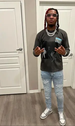 Lil Keed wearing Pedestrian t-shirt