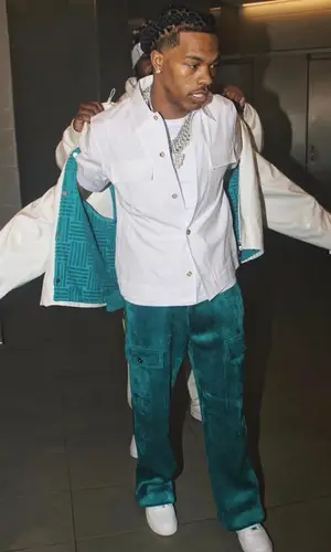 Lil Baby wearing Bottega Veneta shirt