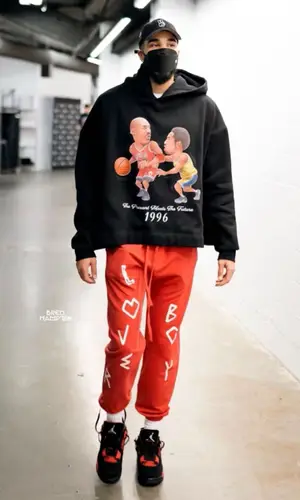 Jayson Tatum wearing For Those Who Sin pants