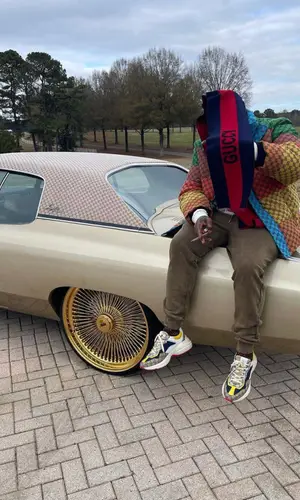 Rick Ross wearing Cartier eyewear