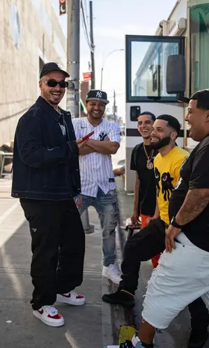 J Balvin wearing Prada cap