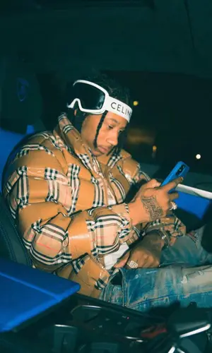 Digga D wearing Amiri jeans