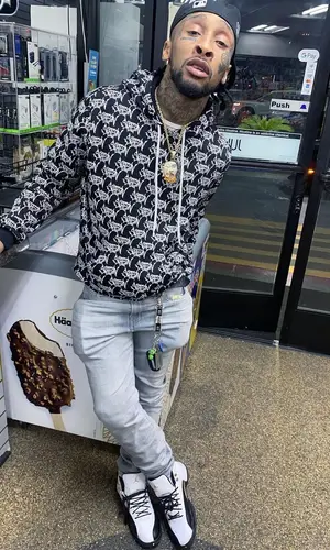 Shordie Shordie wearing Louis Vuitton belt