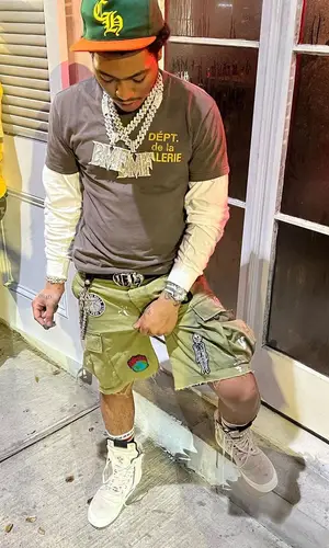 Lil Meech wearing Chrome Hearts cap