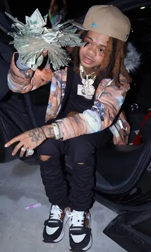 SpotemGottem wearing Ksubi jeans
