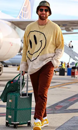 Travis Kelce wearing Raf Simons sweater