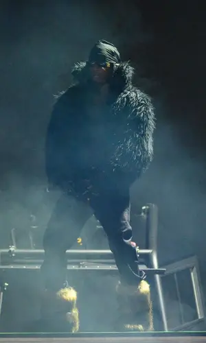 Playboi Carti wearing Balenciaga jacket