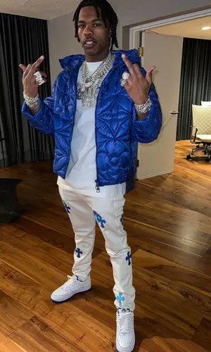 Lil Baby’s Outfit in Louis Vuitton Jacket, Dior T-Shirt & Chrome Hearts Jeans (2021)