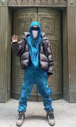 Bloody Osiris wearing Louis Vuitton pants