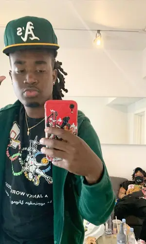 Cochise wearing Supreme jacket