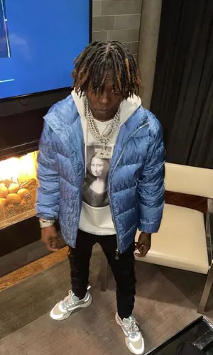 Jackboy wearing Dior bag