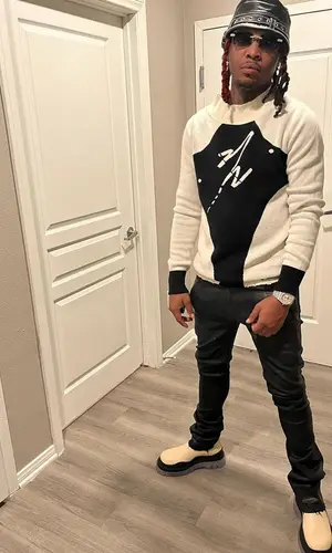Lil Keed wearing 730la hat