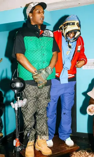 ASAP Rocky wearing Gucci cap