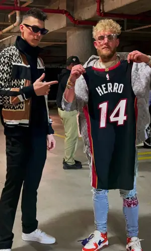 Tyler Herro wearing Valentino sweatshirt