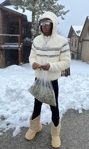 Rich The Kid wearing Yeezy boots