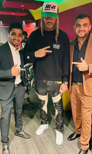 Future wearing RoyGBiv cap