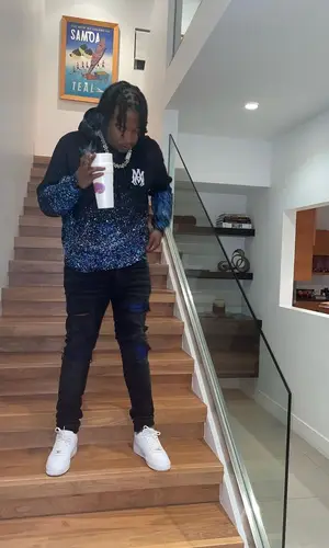 Ballout wearing Amiri jeans