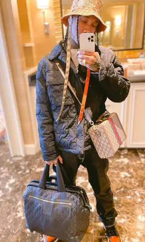 Tyga wearing Gucci hat