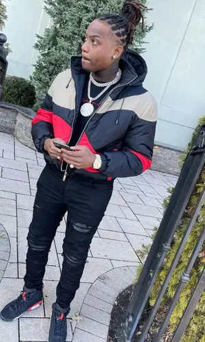 Flipp Dinero wearing Jordan sneakers