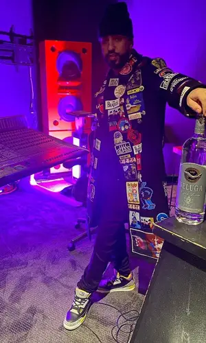 French Montana wearing Stella McCartney jacket